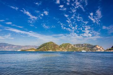 Obraz premium Rocky mountain Islands in the Bay of Marmaris. Seascape with blue sky.