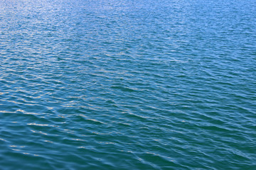 Blue clean sea water surface texture horizontal ripples background wallpaper