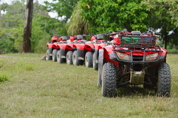 ATVs in a lineup ready to go on tour
