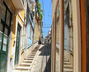 Lisboa/ Narrow streets with tram