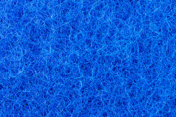 Fototapeta na wymiar Colored, blue background, texture tangled fishing line, rope.