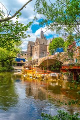 Naklejka premium MARBURG, LAHN. GERMANY - The old Weidenhäuser Lahn bridge is restored and a view of the old university in the center of Marburg in Hesse.