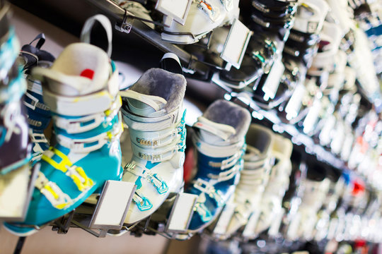 Image of modern ski boots on showcase