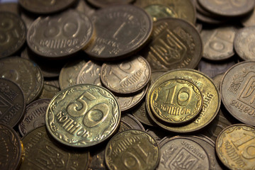 Naklejka premium Ukrainian coins, many money - hryvnia and a penny, background