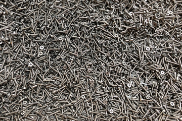 Flat Lay of a background of metal nails in a store on sale.