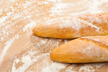 Artisanal French baguettes on a table