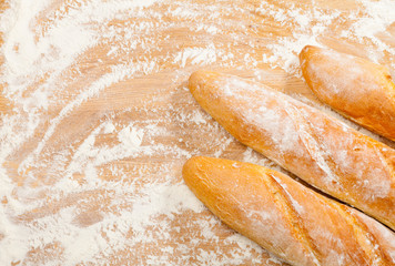 Artisanal French baguettes on a table
