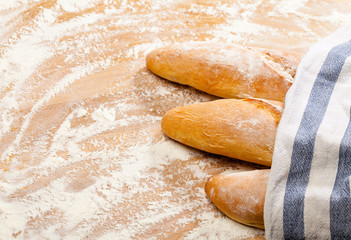 Artisanal French baguettes on a table
