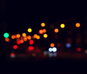 Color bokeh of light city street. Night city. Abstract background.