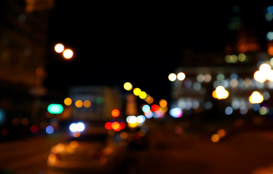 Night city. Color bokeh of light city street. Abstract background.
