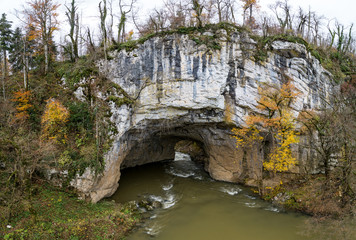 Fototapeta na wymiar Rakov Skocjan (Rakov Škocjan) is a karst valley and the oldest landscape park in Slovenia. Big Natural Bridge (Veliki Naravni Most) is most important geologic phenomena of the park. 
