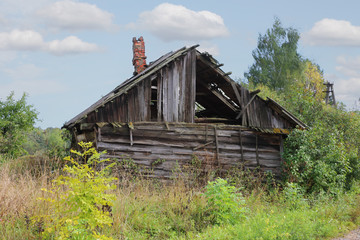 Fototapeta na wymiar Abandoned Russian traditional rural house