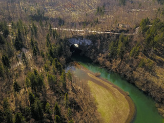 Fototapeta na wymiar Rakov Skocjan (Rakov Škocjan) is a karst valley and the oldest landscape park in Slovenia. Big Natural Bridge (Veliki Naravni Most) is most important geologic phenomena of the park. 