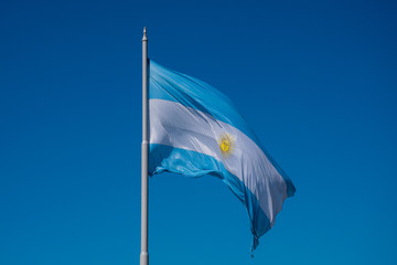The flag of Argentina (Bandera argentina - Bandera Nacional) is a horizontal triband of light blue (top and bottom) and white with the Sun of May centered on the white band. Buenos Aires, Argentina