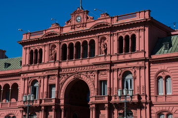 Fototapeta na wymiar The Pink House (Casa Rosada) also known as Government House (Casa de Gobierno) is the executive mansion and office of the President of Argentina. Buenos Aires, Argentina