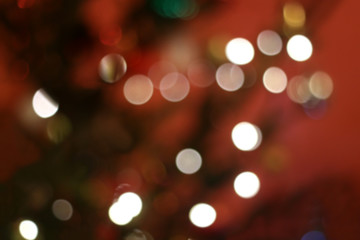 Defocused Christmas tree, colorful bokeh, Christmas background.
