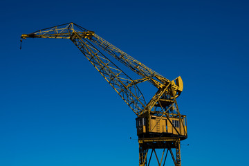 Old crane in Puerto Madero neighborhood, the newest barrio (district) of Buenos Aires, Argentina