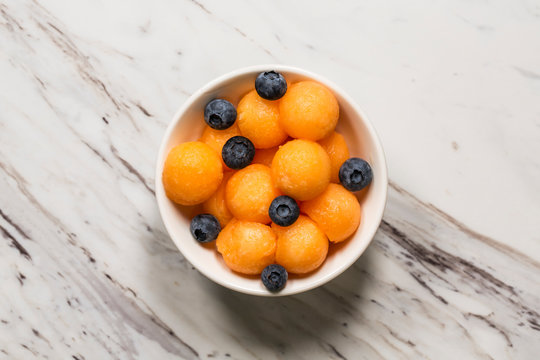 Cantaloupe and blueberries