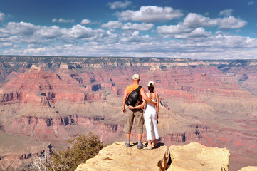 Couple on rim in Grand Canyon USA