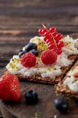 Sandwich with nuts and berrie Useful breakfast.