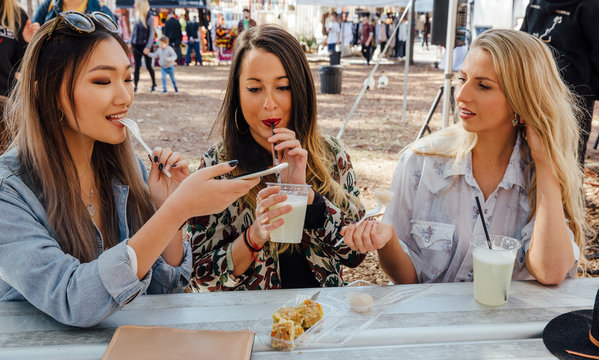 Women Takes a Picture of Her Meal