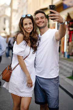 young couple with phone