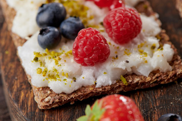 Sandwich with nuts and berrie Useful breakfast.