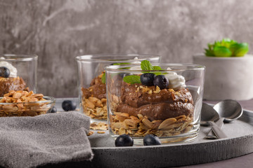 Glass cups of chocolate and chestnuts mousse