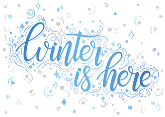 Holidays typography.Winter is here - Hand painted lettering with stylized snowflakes,swirls and sparkles.Seasons greetings card designs perfect for prints, flyers, cards and more.
