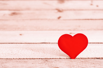 Heart on a wooden background. Valentine's Day