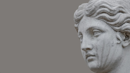 Fototapeta na wymiar Ancient statue of sensual Italian renaissance era woman, Potsdam, Germany, details, closeup