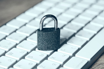 security lock on white computer keyboard