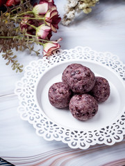 Healthy organic date energy balls with berry, dried fruits and nuts. Food for healthy lifestyle.