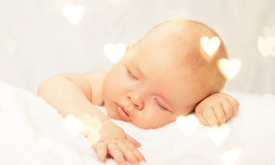 Obraz na płótnie Canvas Newborn Baby Boy Sleeping Peacefully on Blue Blanket