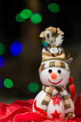 representation of snowman and colored lights