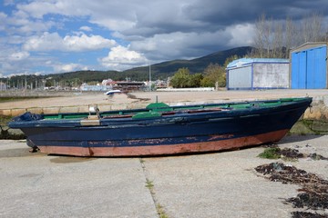 Fototapeta premium wooden fishing boat moored