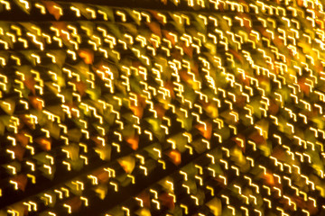 Fototapeta premium Abstract xmas Gold sparkles or glitter lights. Christmas festive gold background. Defocused bokeh particles. Template for design
