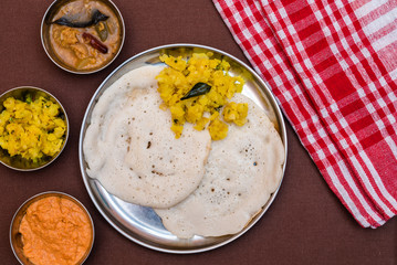 South Indian breakfast Dosa with sambar, chutney and aloo baji