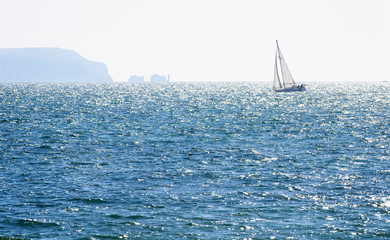 Fototapeta premium Sailing yacht at sea off the Needles, Isle of Wight, Hampshire, England, UK.