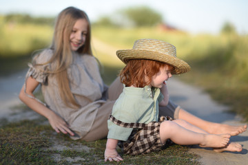 Portrait of a boy and girl  in summer