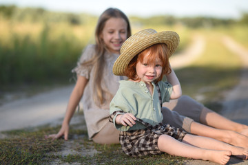 Portrait of a boy and girl  in summer