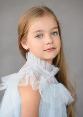 portrait of little girl outdoors in summer