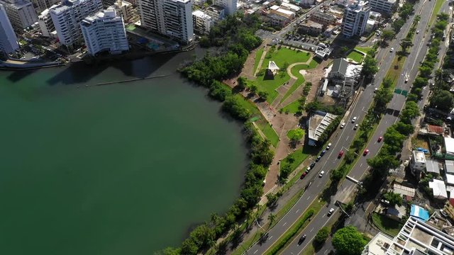 Forward aerial drone shot that shows the Laguna del Condado area of San Juan, Puerto Rico.