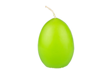 Green egg shaped candle isolated on white background