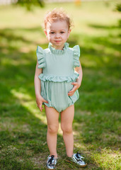 Fototapeta premium portrait of little girl outdoors in summer