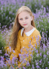 portrait of little girl outdoors in summer