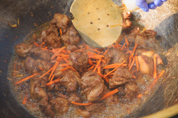 pilaf and other dishes in the cauldron. Methods and ingredients for cooking pilaf. Lamb and beef in Eastern cuisine