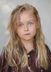 portrait of little girl outdoors in summer © zagorodnaya