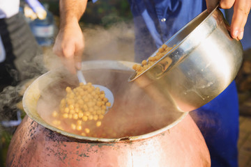 pilaf and other dishes in the cauldron. Methods and ingredients for cooking pilaf. Lamb and beef in Eastern cuisine