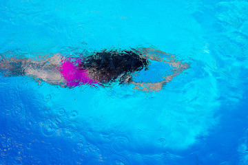 Diving in swimming pool top view